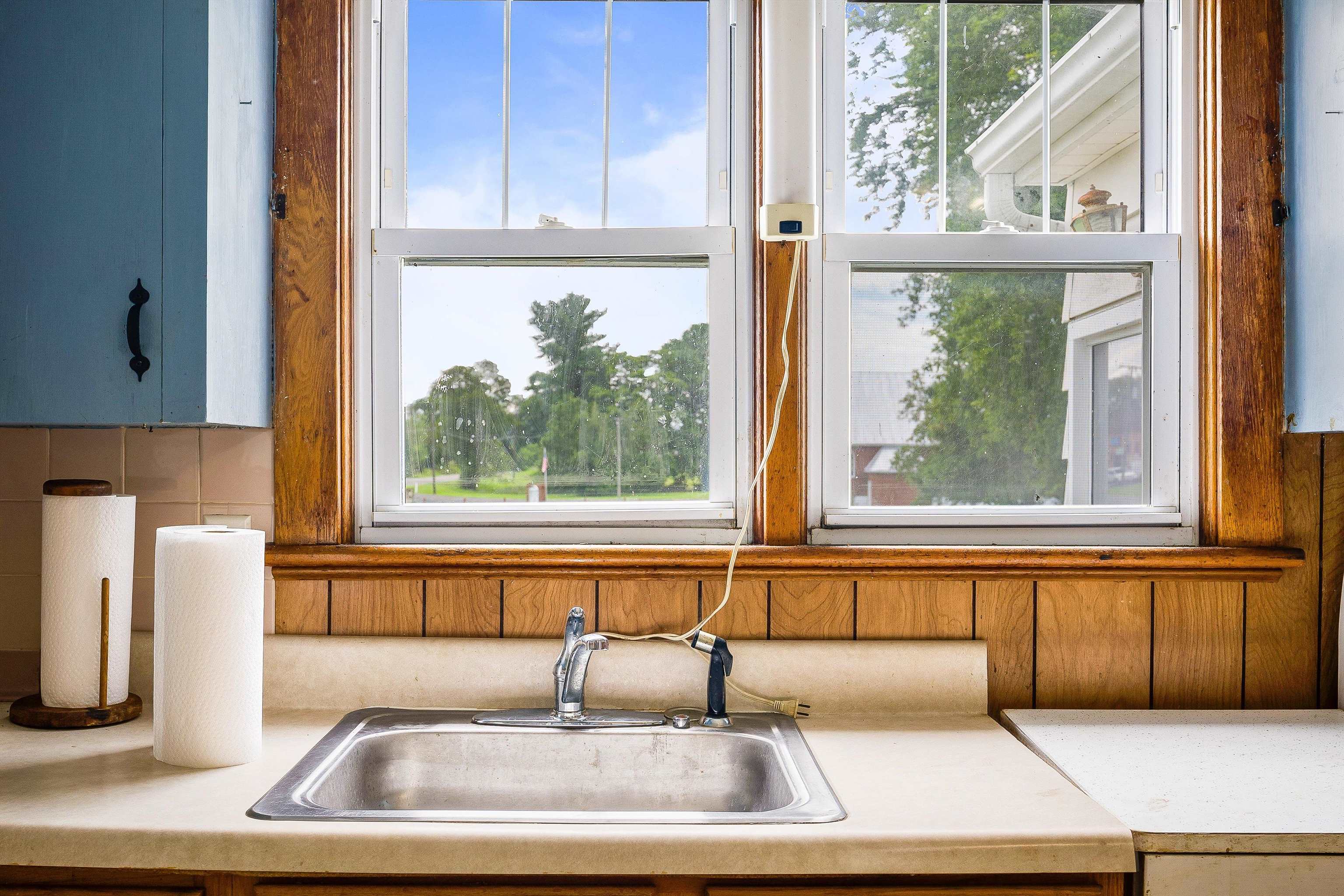 6507 East Point Road Elkton, VA 22827 - Photo 20 of 39 a kitchen with a window a sink and a window