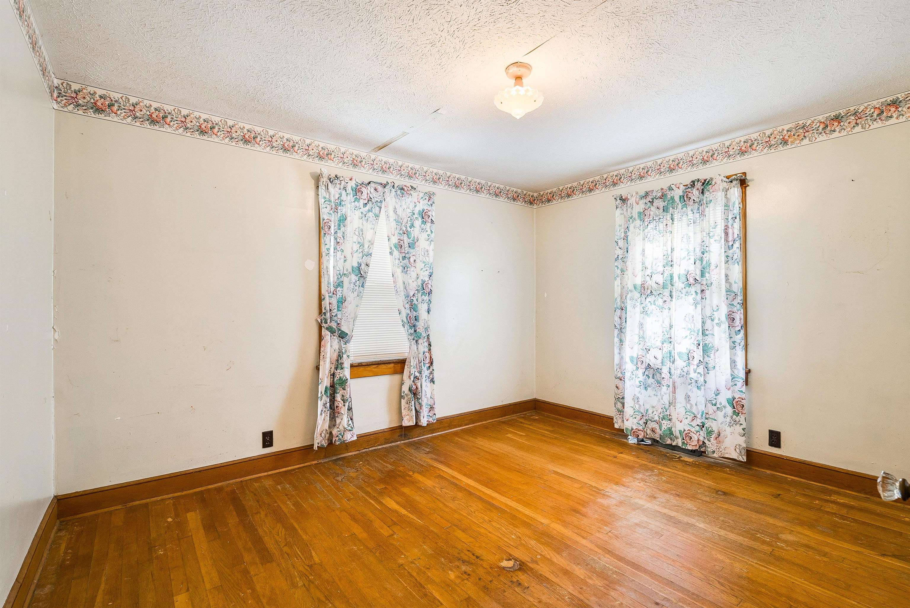 6507 East Point Road Elkton, VA 22827 - Photo 24 of 39 a view of empty room with wooden floor