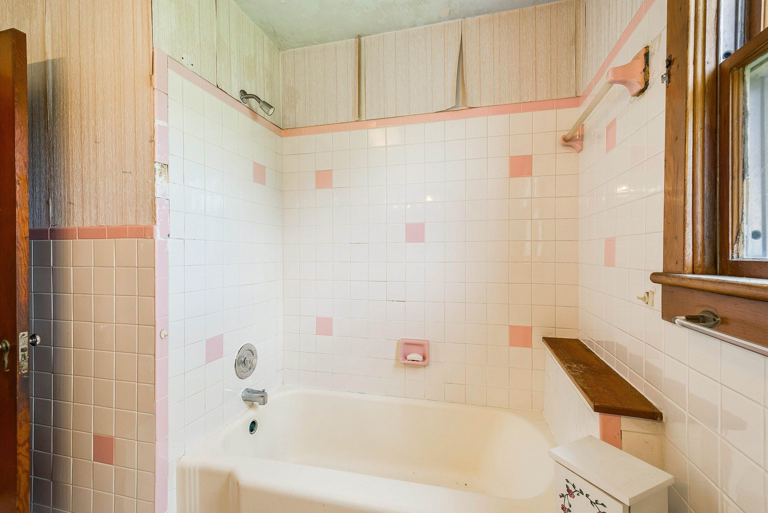 6507 East Point Road Elkton, VA 22827 - Photo 27 of 39 a bathroom with a bathtub and a shower