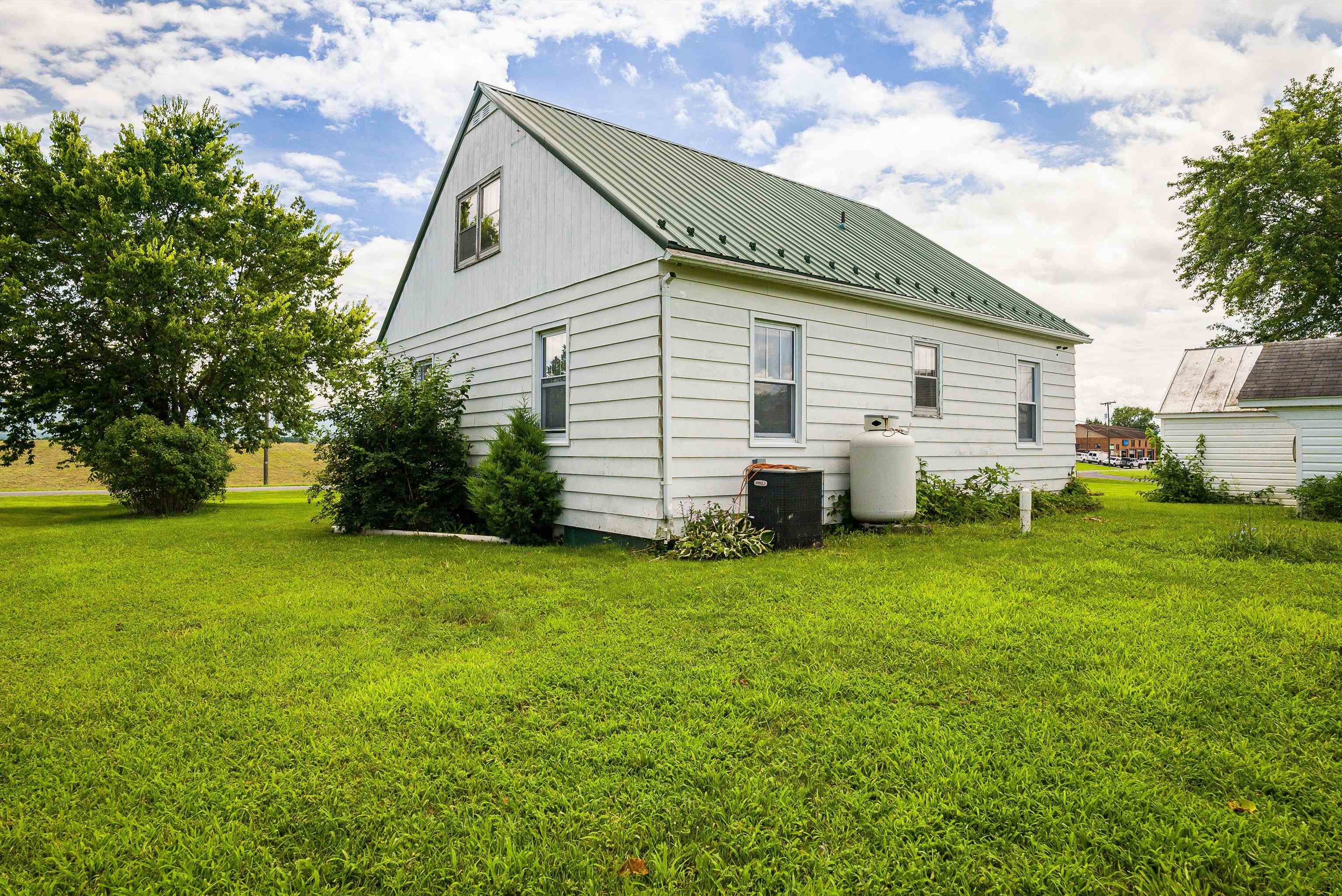 6507 East Point Road Elkton, VA 22827 - Photo 37 of 39 a view of a backyard with plants and large tree