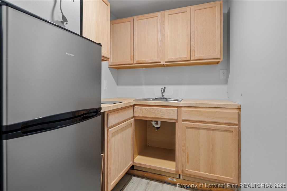 7124 Holmfield Road Fayetteville, NC 28306 - Photo 40 of 45 a utility room with washing machine