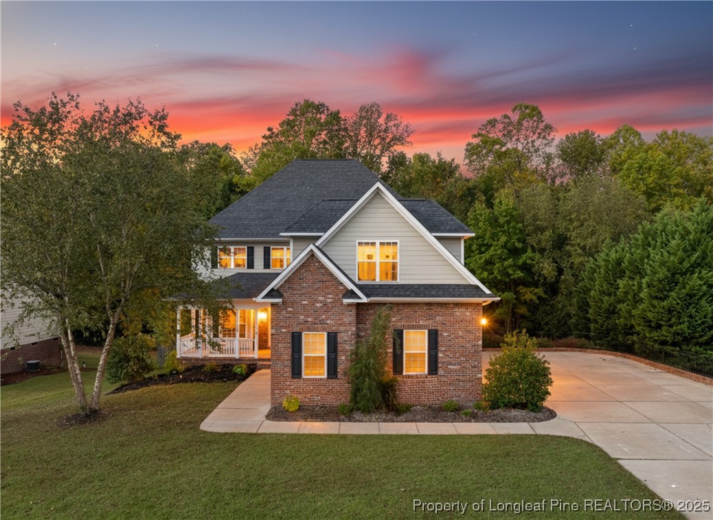 7124 Holmfield Road Fayetteville, NC 28306 - Photo 45 of 45 a front view of a house with a yard