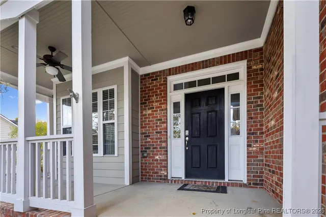 a kitchen with stainless steel appliances granite countertop a sink and stove top oven