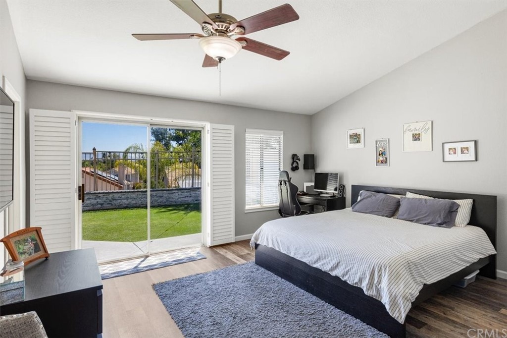 43176 Corte Calanda Temecula, CA 92592 - Photo 11 of 26 a bedroom with a large bed and a window