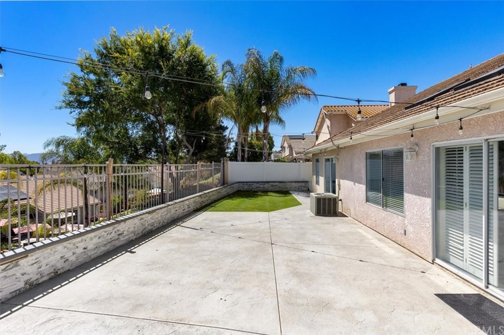 43176 Corte Calanda Temecula, CA 92592 - Photo 16 of 26 a view of a house with backyard and sitting area