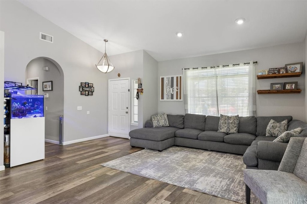 43176 Corte Calanda Temecula, CA 92592 - Photo 3 of 26 a living room with furniture and a window