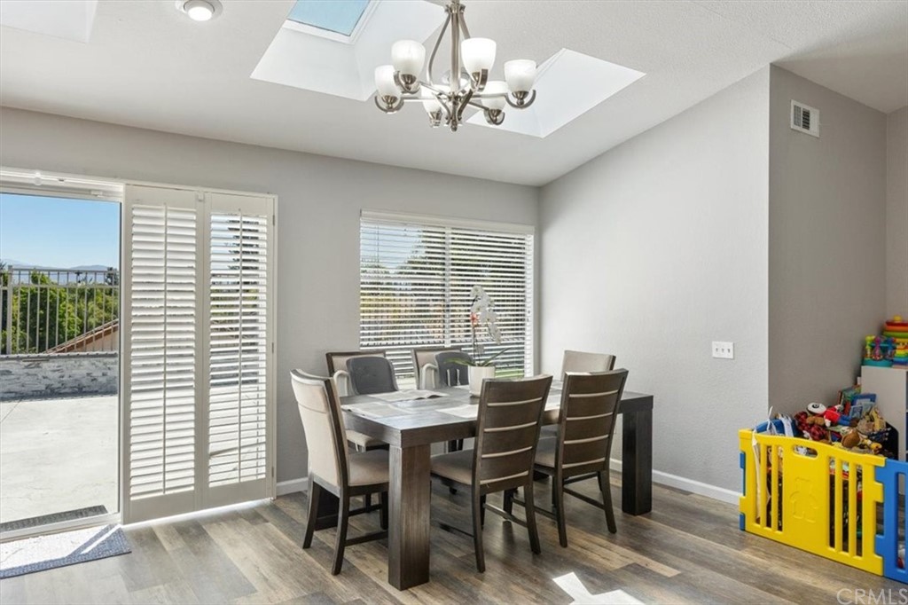 43176 Corte Calanda Temecula, CA 92592 - Photo 8 of 26 a view of a dining room with furniture and window