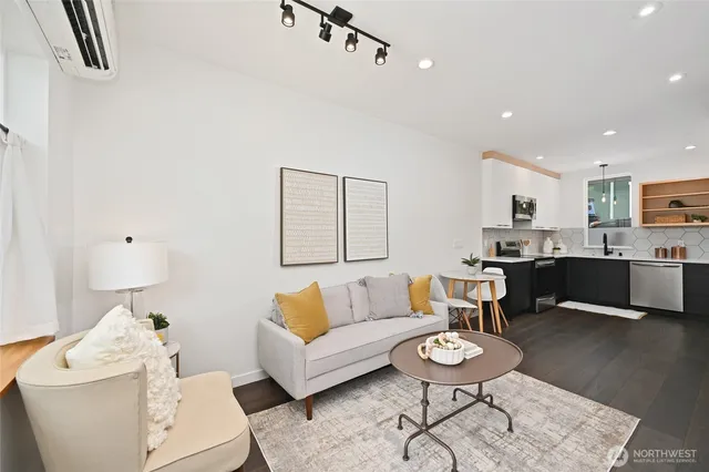 a living room with furniture and a table