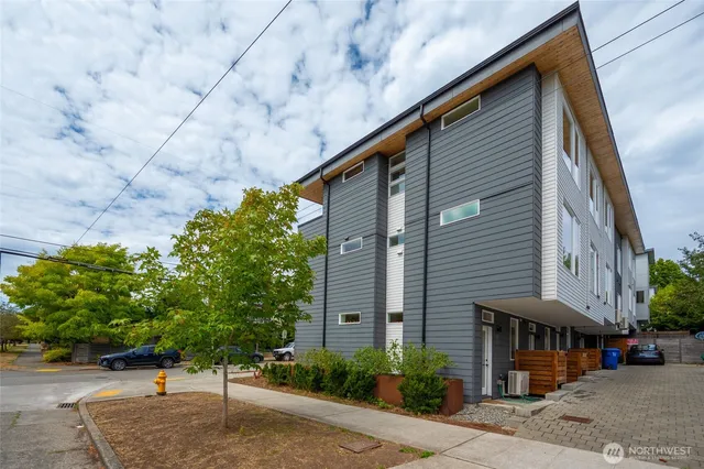 a street sign on a brick wall