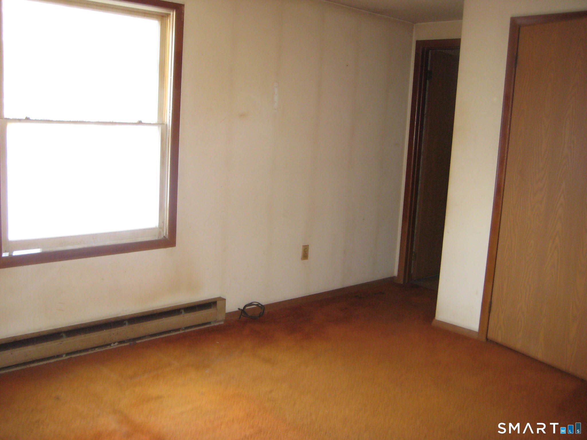 645 Buff Cap Road Tolland, CT 06084 - Photo 4 of 10 a view of a room with a window