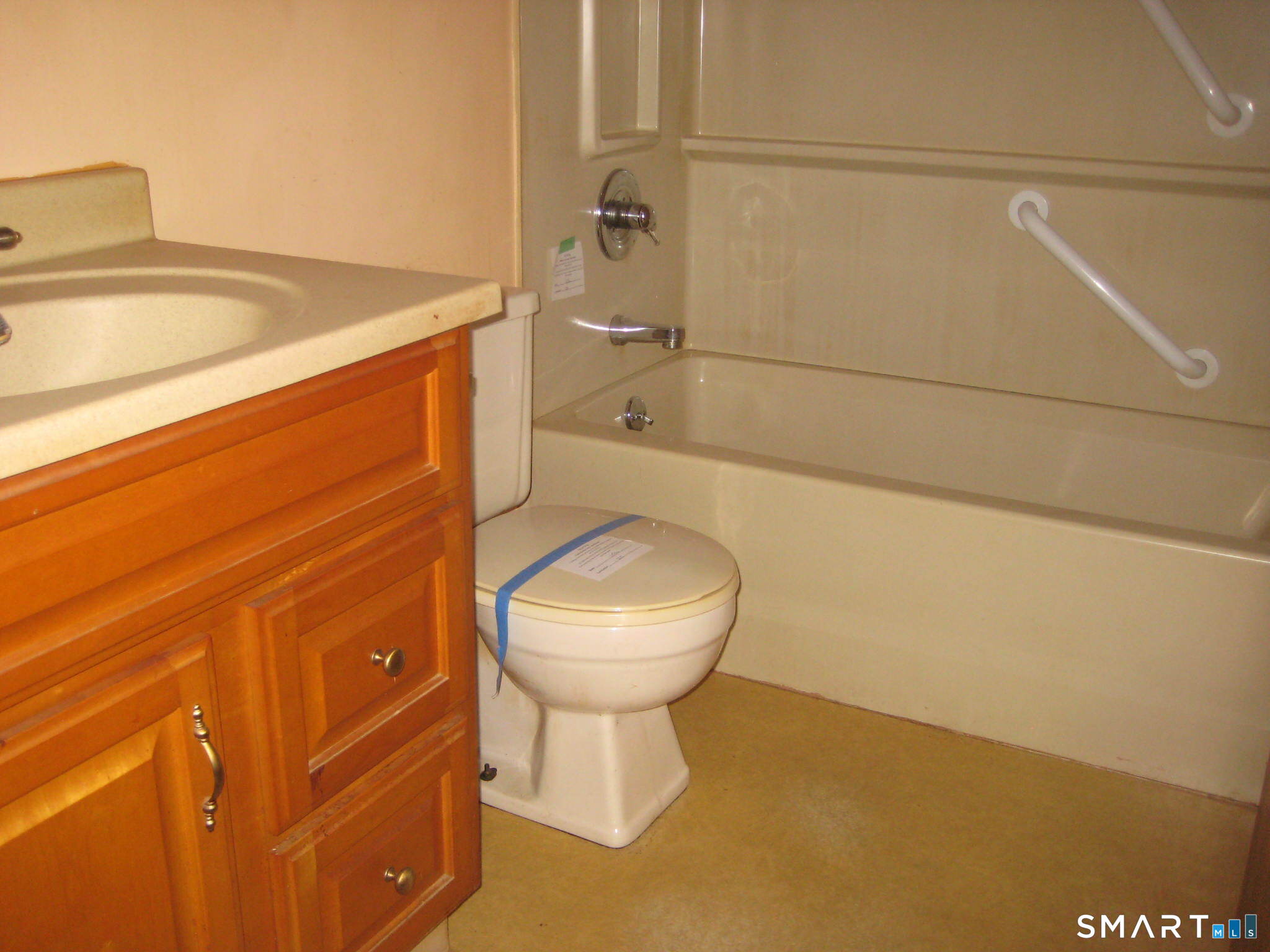 645 Buff Cap Road Tolland, CT 06084 - Photo 8 of 10 a bathroom with a sink and toilet