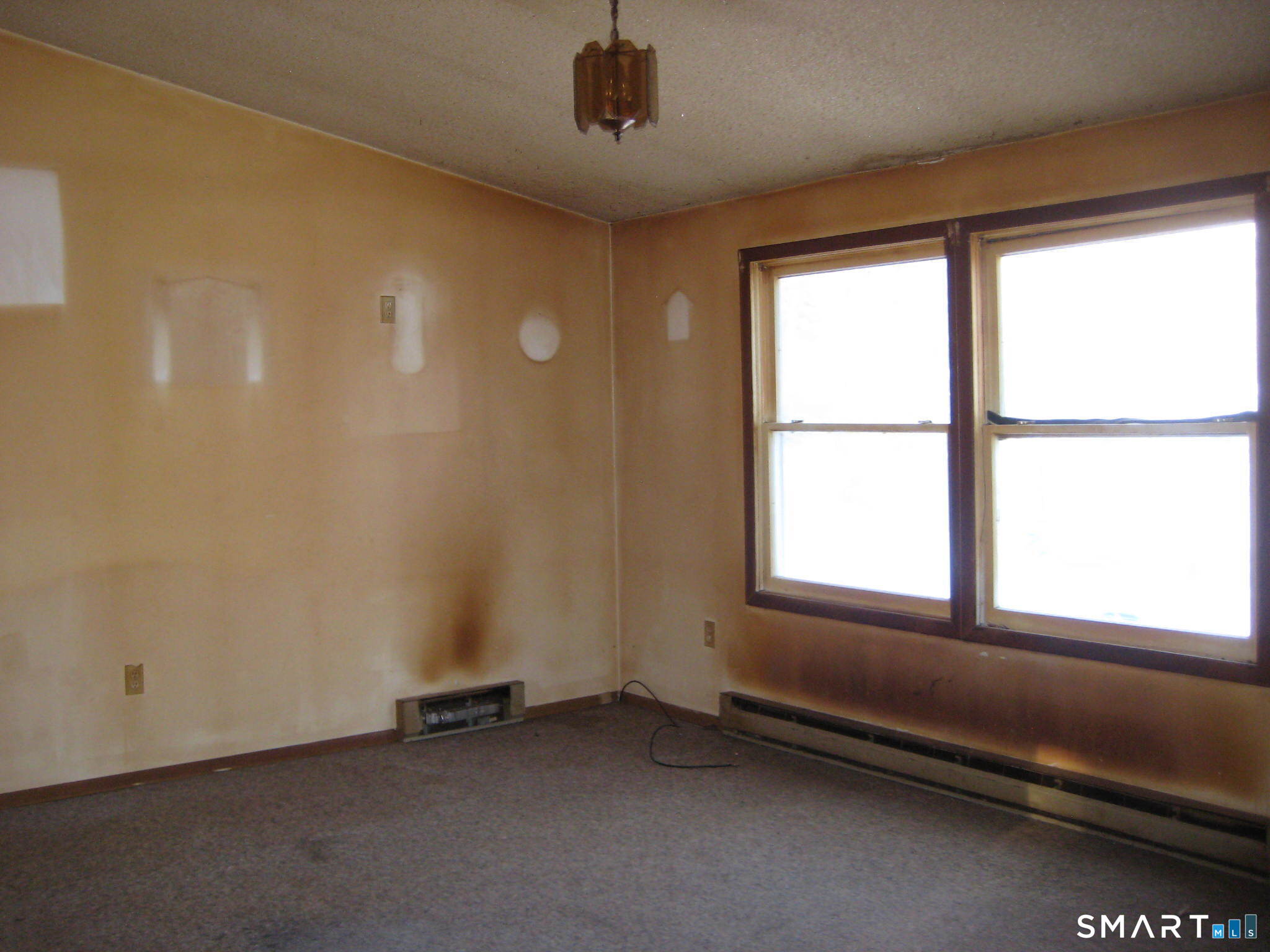 645 Buff Cap Road Tolland, CT 06084 - Photo 10 of 10 an empty room with a window