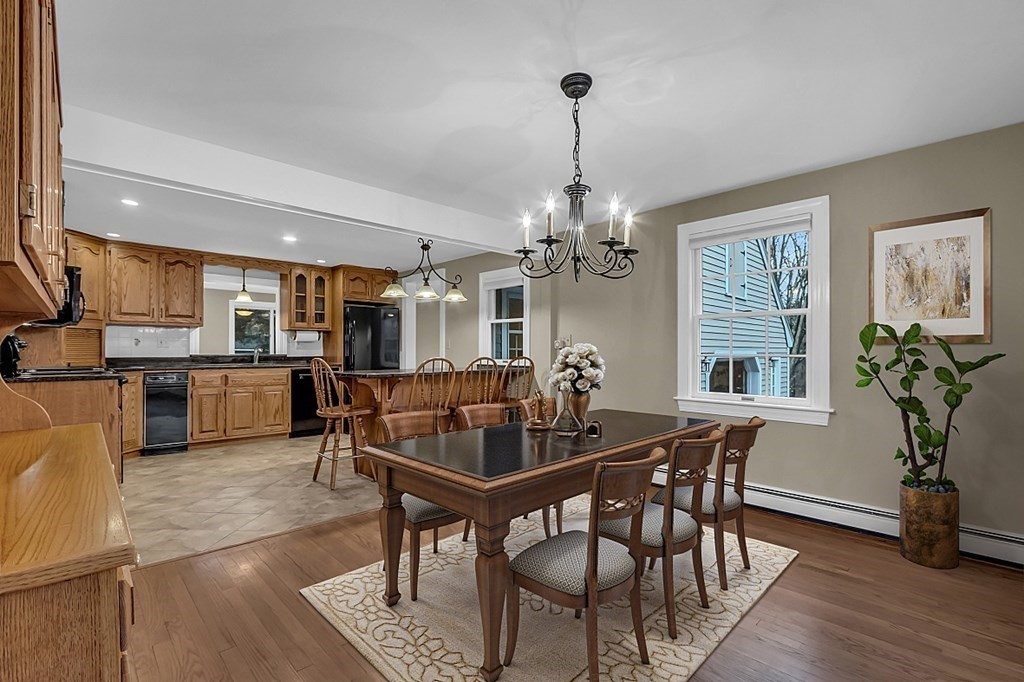 8 Springhill Road Wayland, MA 01778 - Photo 7 of 44 a view of a dining room with furniture window and wooden floor