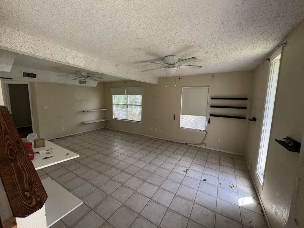 6133 Inca Drive Mabank, TX 75156 - Photo 4 of 10 a view of a livingroom with a staircase