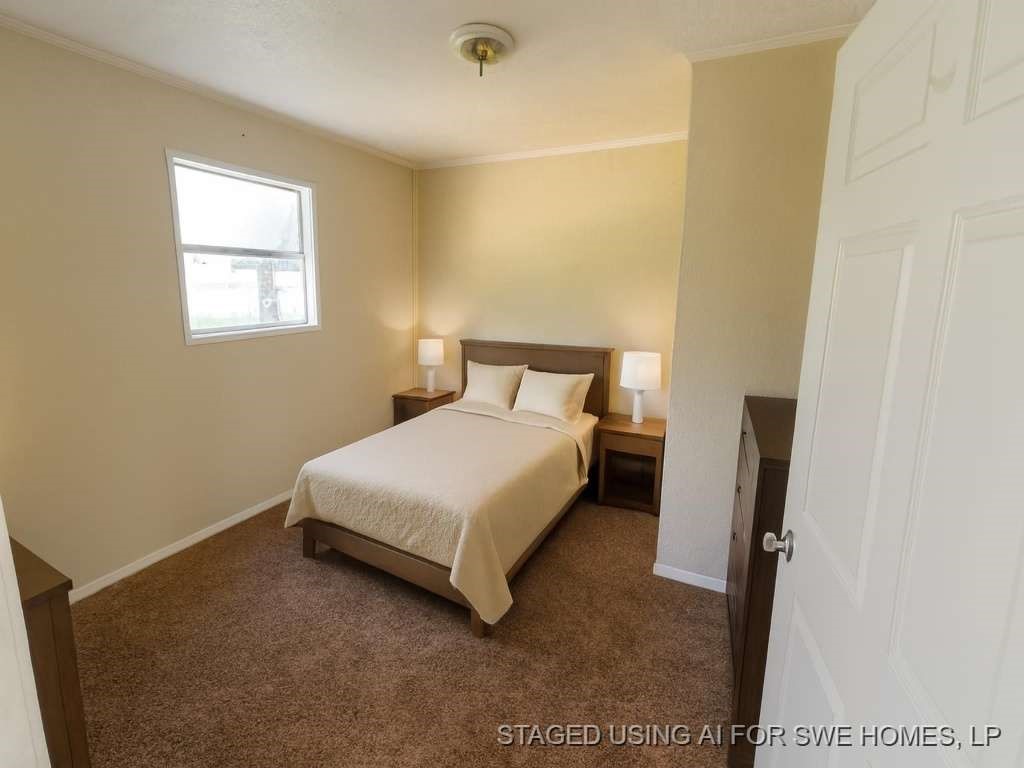 6133 Inca Drive Mabank, TX 75156 - Photo 9 of 10 a bedroom with a bed and a window