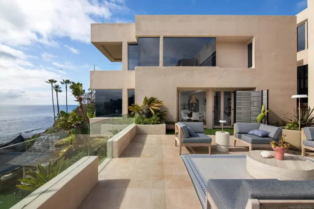 a view of an outside dining space with furniture