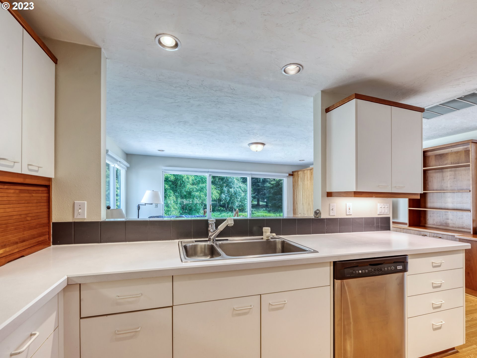 40176 York Lane Springfield, OR 97478 - Photo 14 of 48 a kitchen with a sink cabinets and window