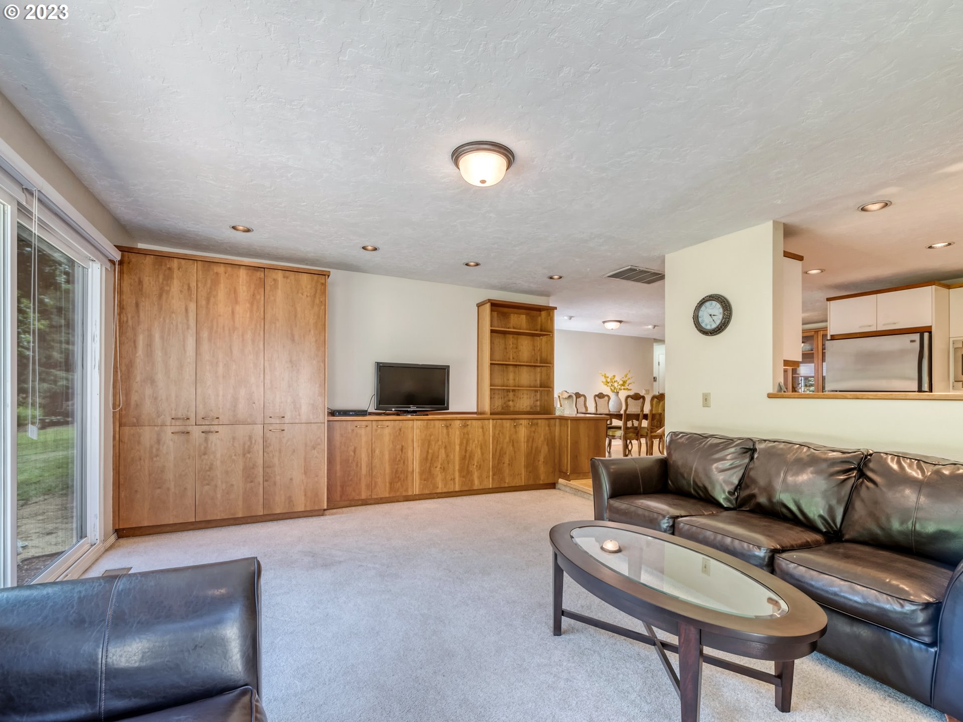 40176 York Lane Springfield, OR 97478 - Photo 15 of 48 a living room with furniture and a flat screen tv