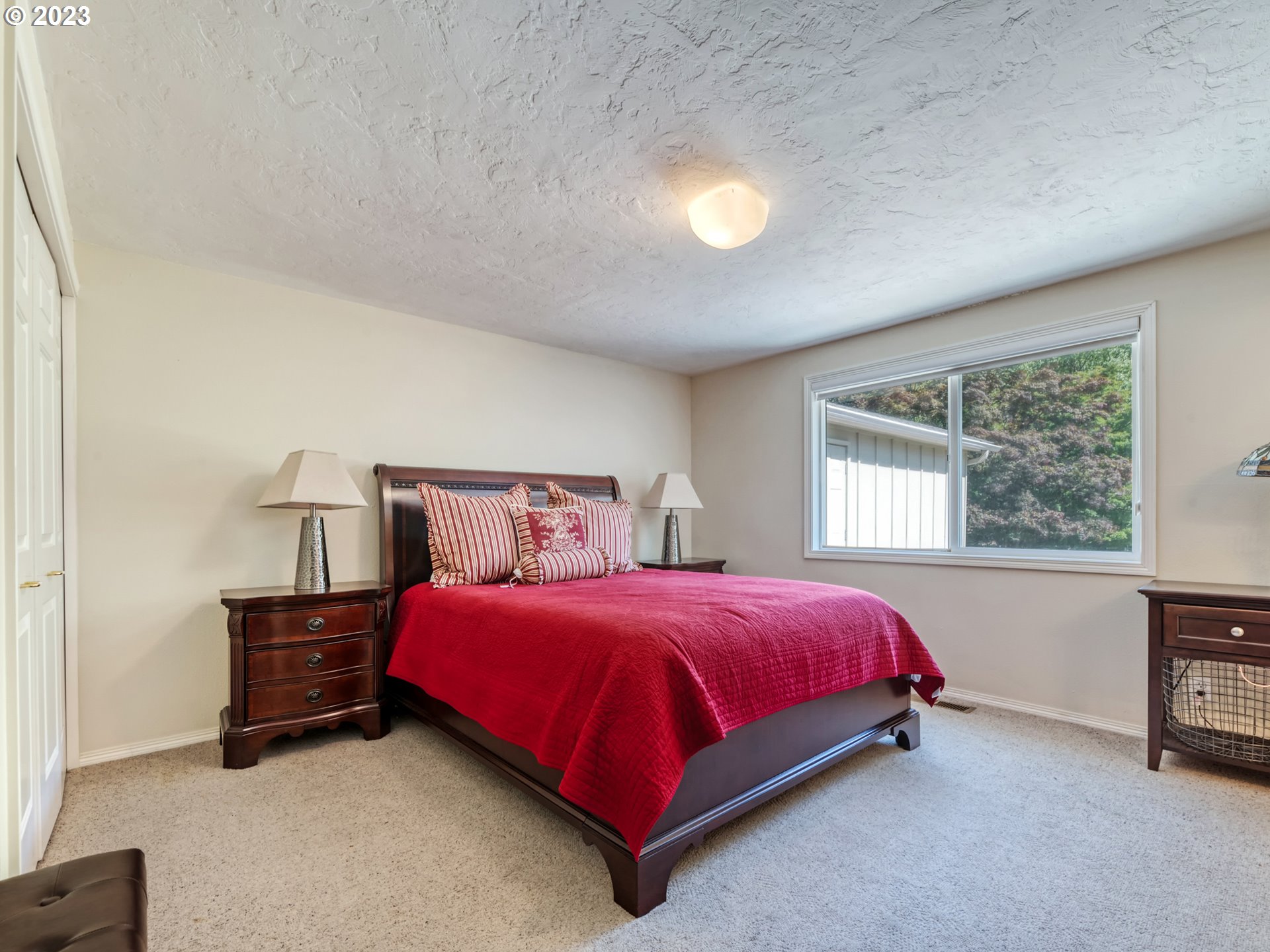 40176 York Lane Springfield, OR 97478 - Photo 19 of 48 a bed sitting in a bedroom next to a window