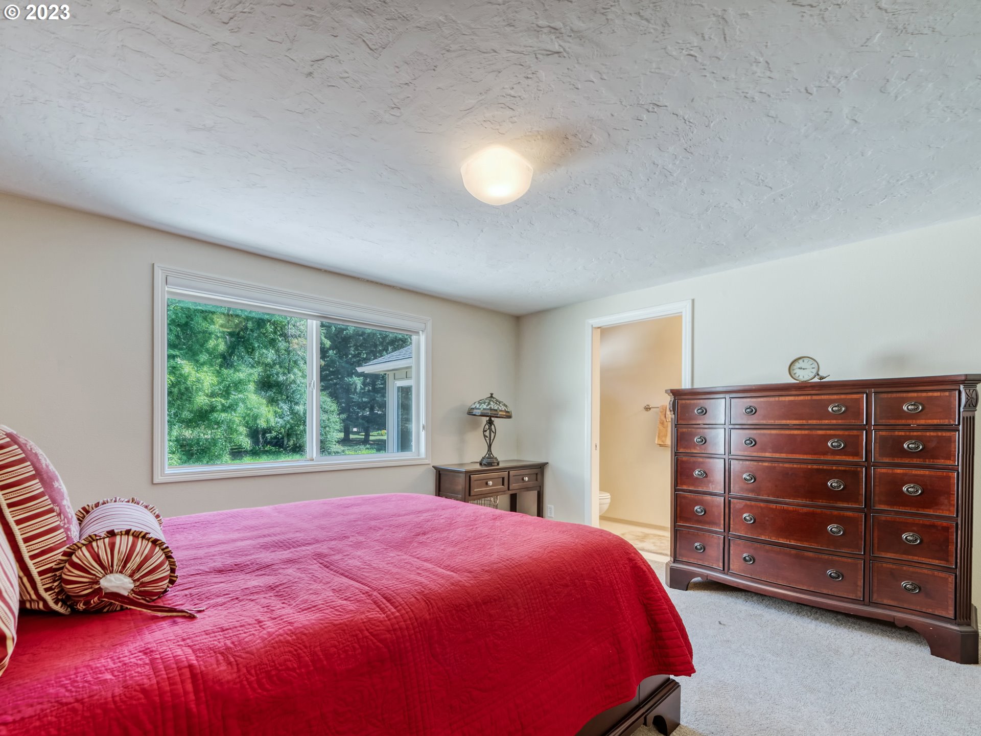 40176 York Lane Springfield, OR 97478 - Photo 20 of 48 a bedroom with a bed and a window