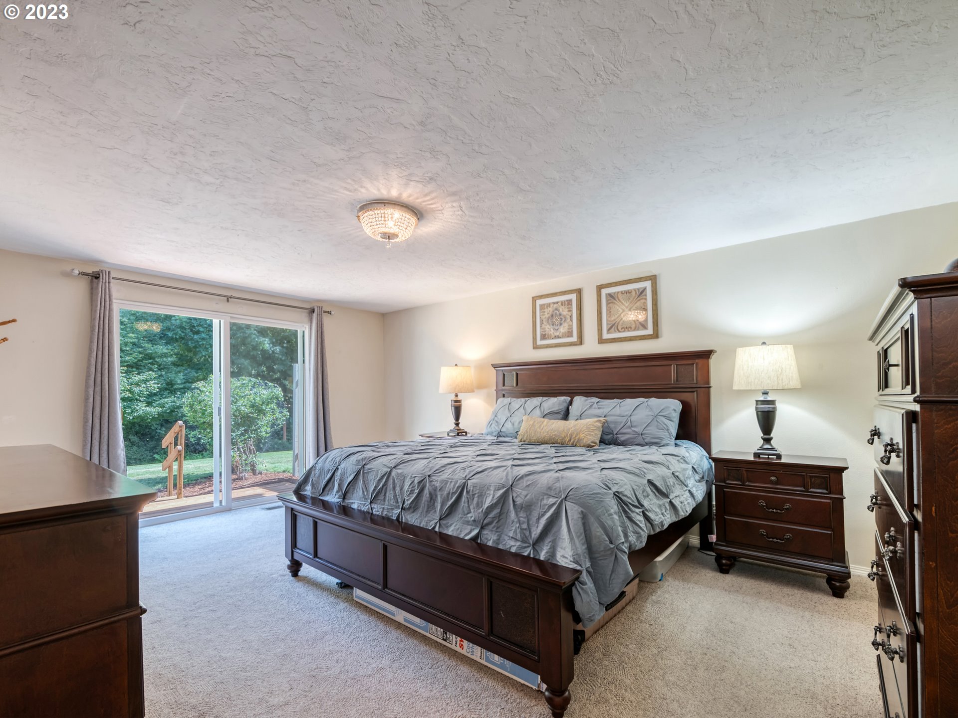 40176 York Lane Springfield, OR 97478 - Photo 25 of 48 a bedroom with a bed and a large window