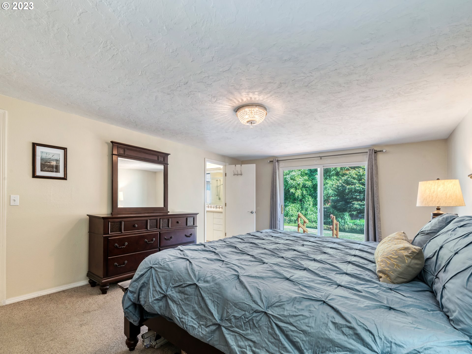 40176 York Lane Springfield, OR 97478 - Photo 26 of 48 a bedroom with a bed and a dresser