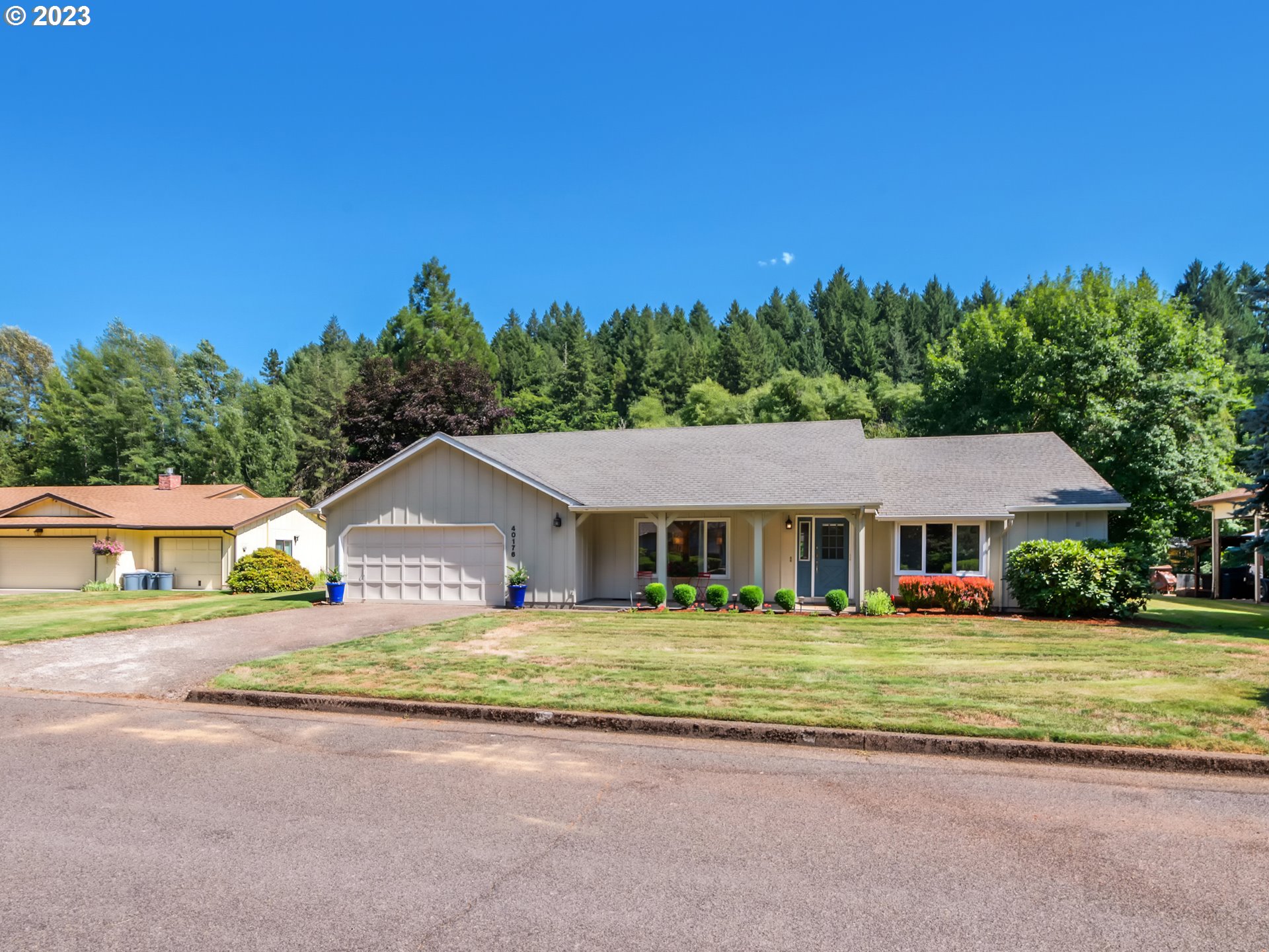40176 York Lane Springfield, OR 97478 - Photo 3 of 48 a house with trees in the background