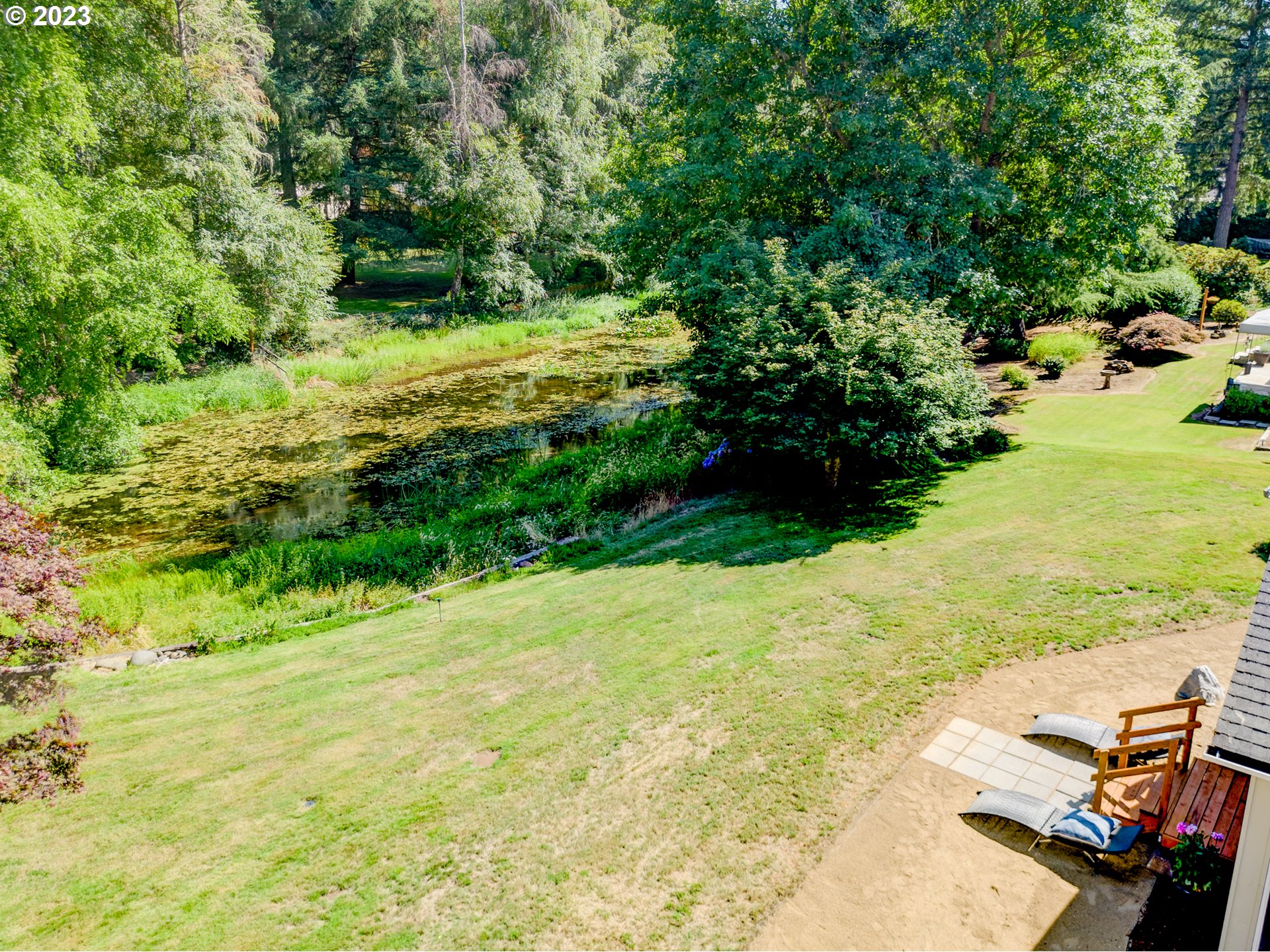40176 York Lane Springfield, OR 97478 - Photo 31 of 48 a view of a yard with an outdoor space
