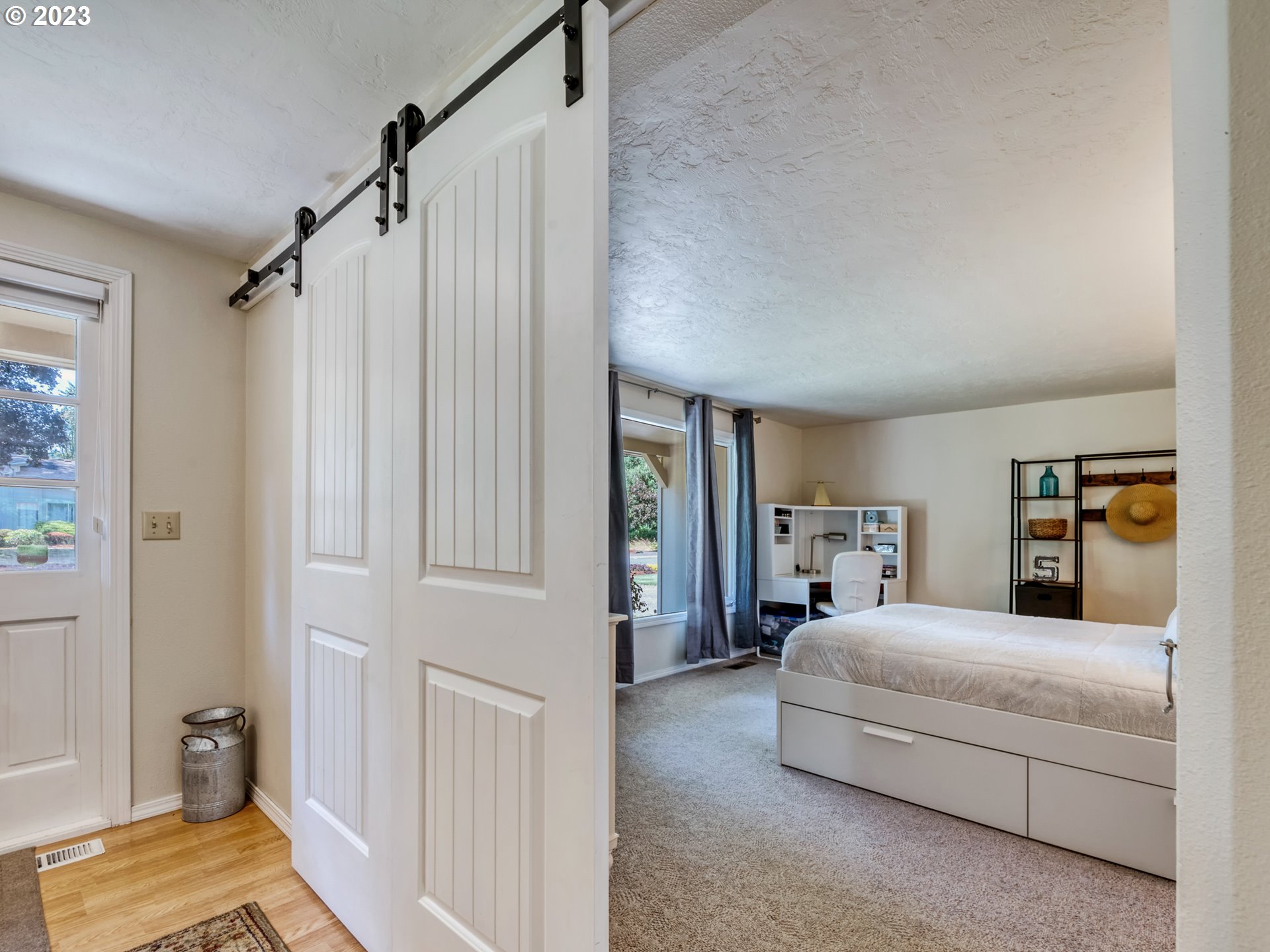 40176 York Lane Springfield, OR 97478 - Photo 5 of 48 a bedroom with a bed and a walk in closet