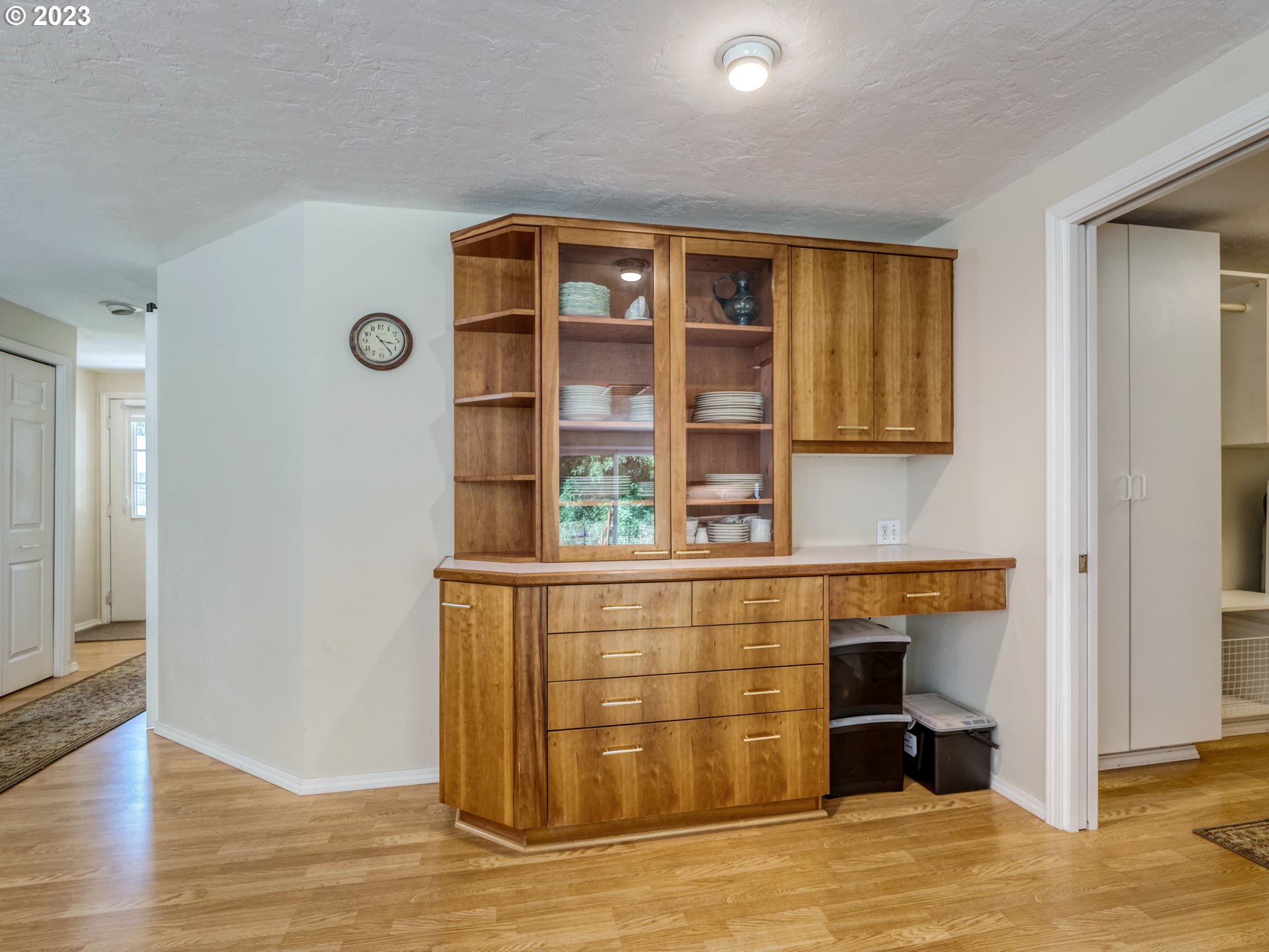 40176 York Lane Springfield, OR 97478 - Photo 8 of 48 a view of a refrigerator in kitchen and wooden floor