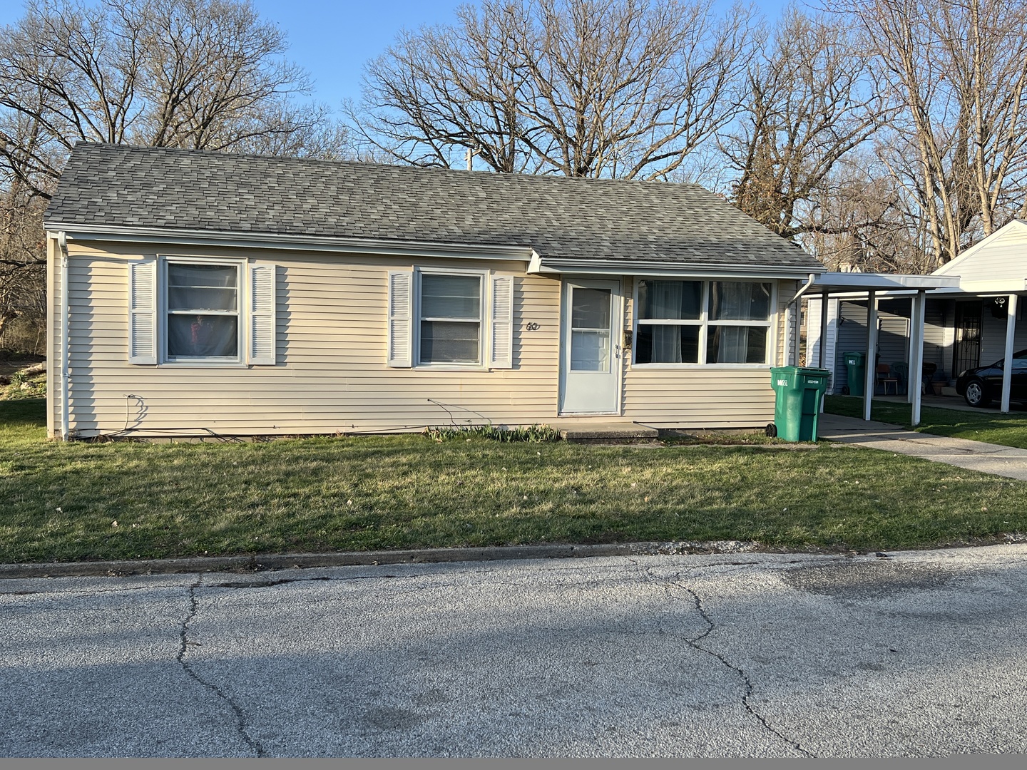 front view of a house and a yard