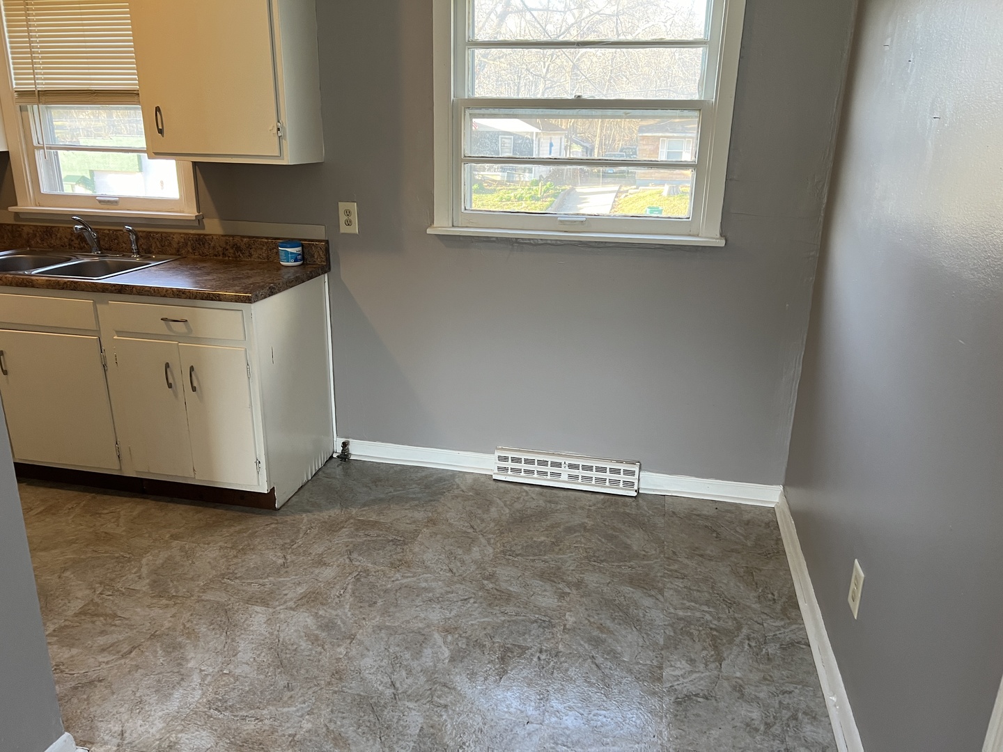 60 Webster Court Decatur, IL 62521 - Photo 5 of 19 a view of a kitchen with appliances cabinets and a window