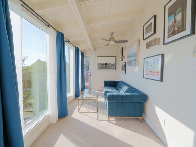 a bathroom with a double vanity sink mirror and shower