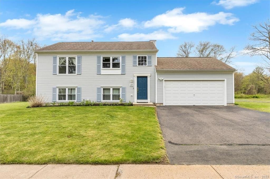 450 Wetherell Street Manchester, CT 06040 - Photo 1 of 1 a view of a house with a yard