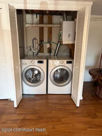 a utility room with dryer and washer