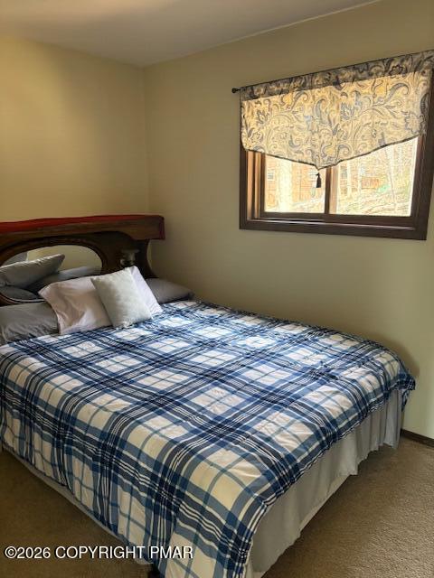 141 Mansfield Court Bushkill, PA 18324 - Photo 23 of 28 a bedroom with a bed and window
