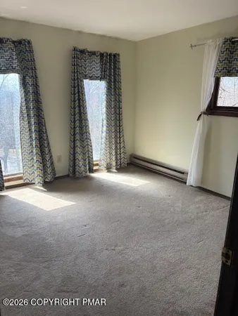 an empty room with windows