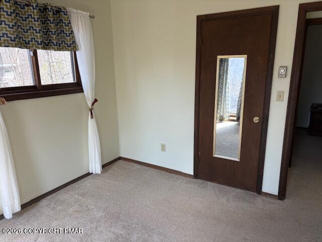 141 Mansfield Court Bushkill, PA 18324 - Photo 26 of 28 an empty room with windows