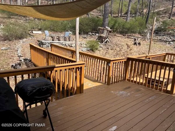 a view of balcony with furniture