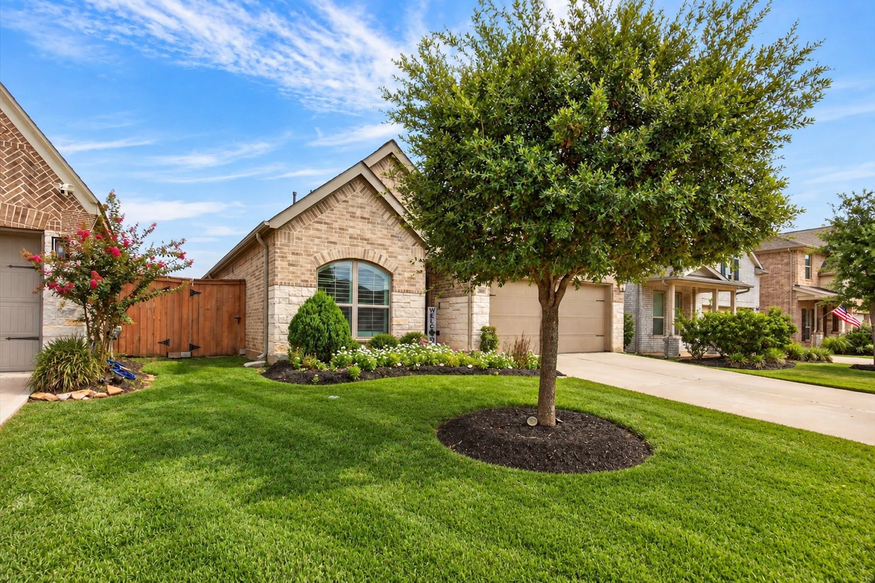 23026 Needle Grass Road Katy, TX 77493 - Photo 3 of 33 Inviting front entry with mature landscaping and welcoming front porch.
