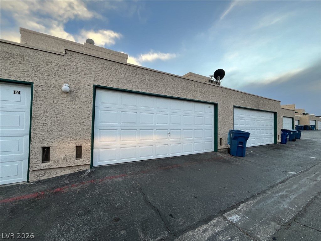 6750 Del Rey Avenue, Unit 123 Las Vegas, NV 89146 - Photo 20 of 21 Secure garage parking units provide convenient, accessible storage solutions.