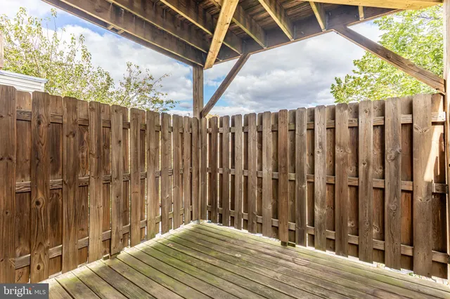 a view of a wooden fence