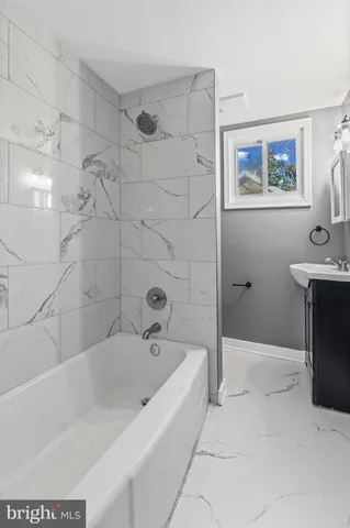 a view of an empty room with wooden roof