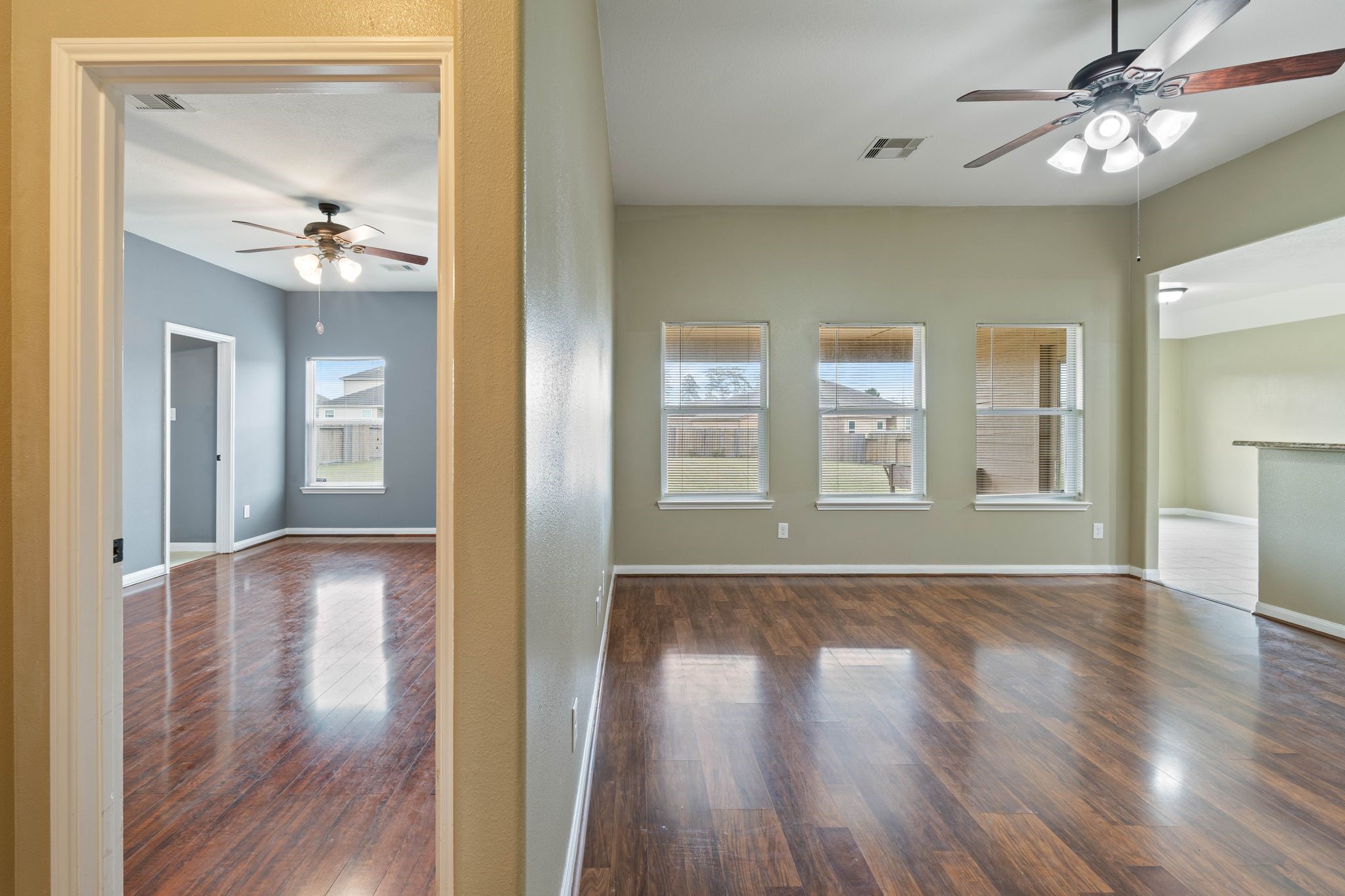 18875 Maverick Ranch Road East Magnolia, TX 77355 - Photo 12 of 45 a view of livingroom with hardwood floor and ceiling fan