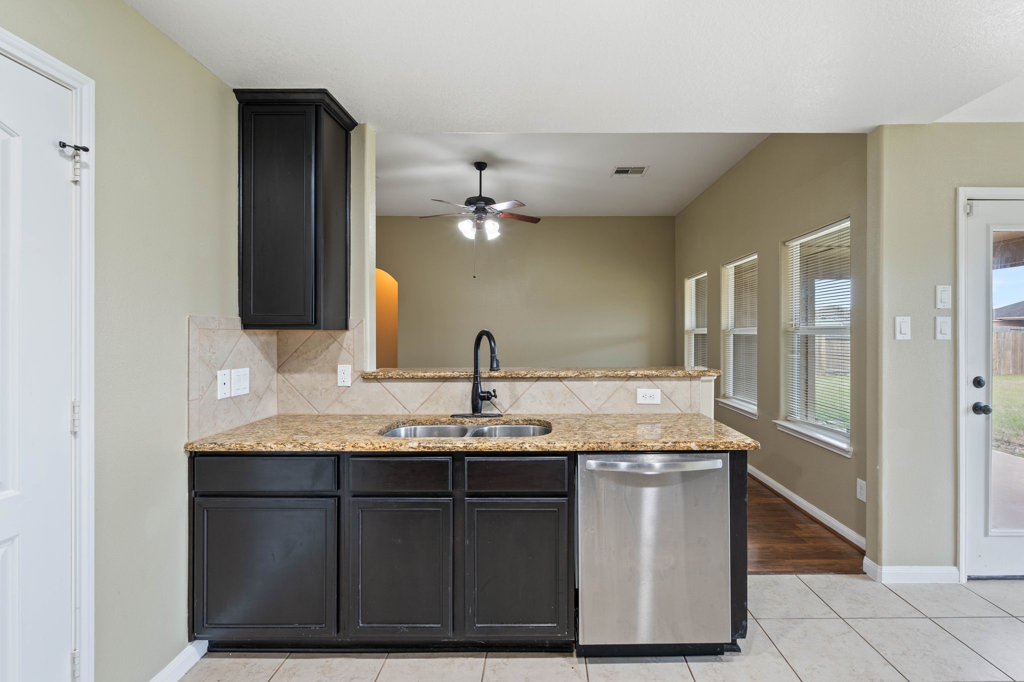 18875 Maverick Ranch Road East Magnolia, TX 77355 - Photo 18 of 45 a bathroom with a granite countertop sink