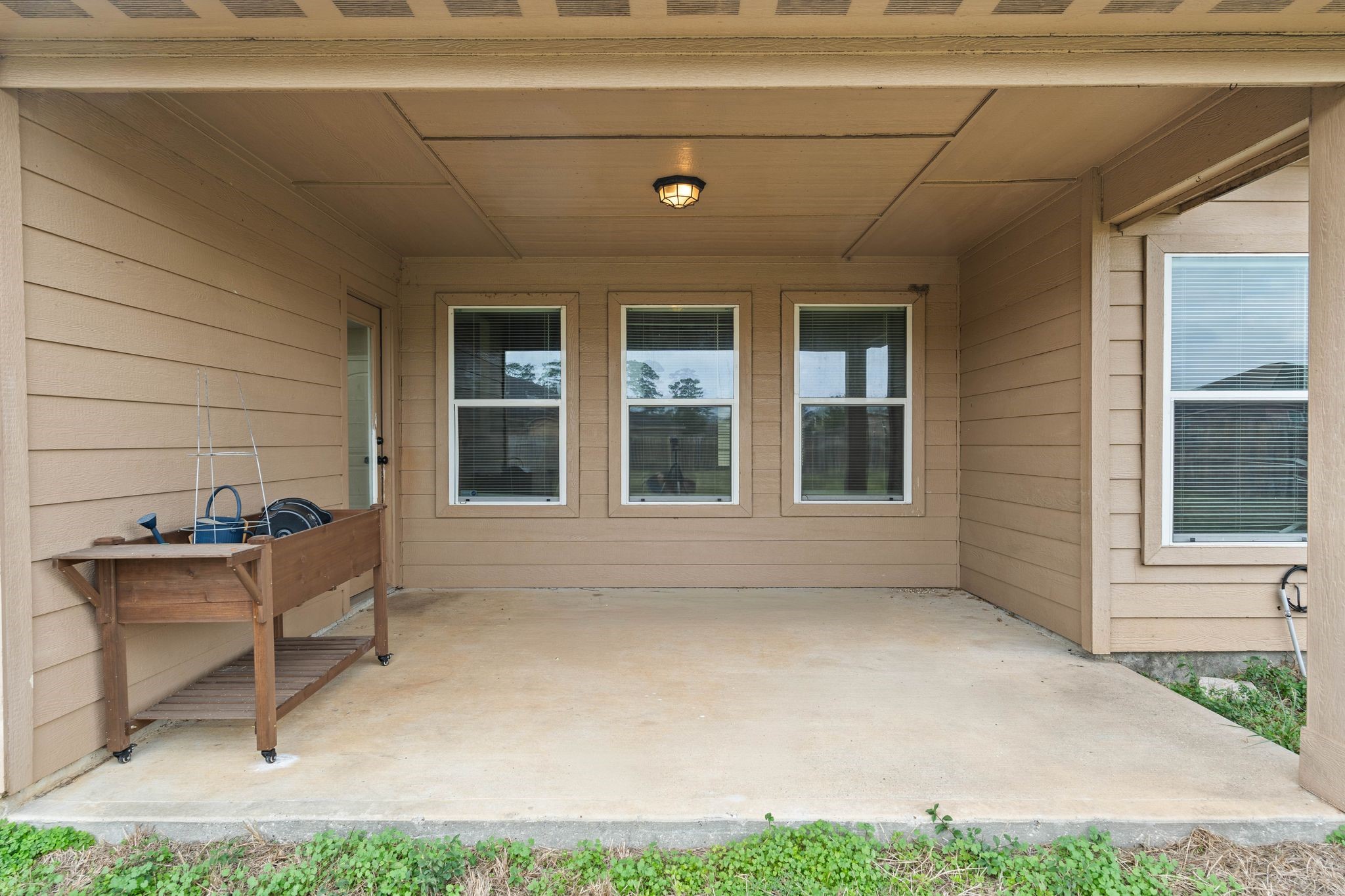18875 Maverick Ranch Road East Magnolia, TX 77355 - Photo 41 of 45 a view of house with backyard