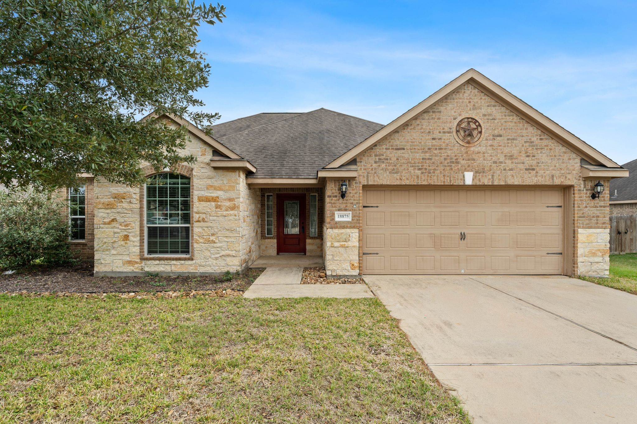 18875 Maverick Ranch Road East Magnolia, TX 77355 - Photo 45 of 45 front view of a house with a yard