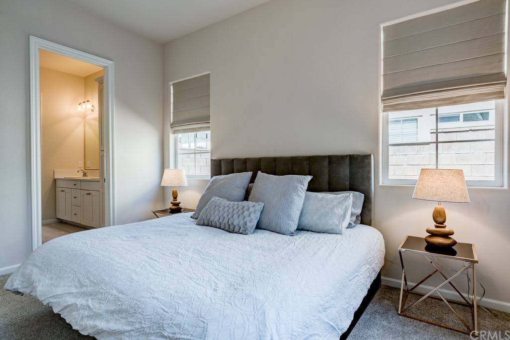 12370 Alamo Drive Rancho Cucamonga, CA 91739 - Photo 24 of 47 a bedroom with a bed and window