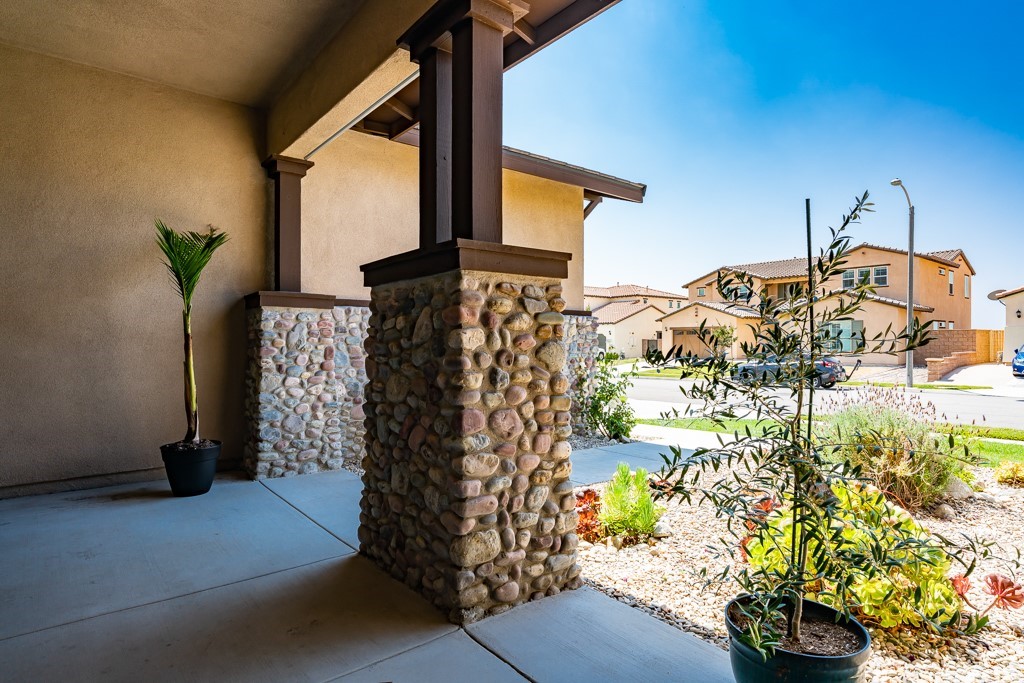12370 Alamo Drive Rancho Cucamonga, CA 91739 - Photo 6 of 47 a front view of a house with a yard