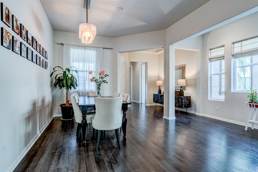 12370 Alamo Drive Rancho Cucamonga, CA 91739 - Photo 9 of 47 a view of a dining room with furniture window and wooden floor